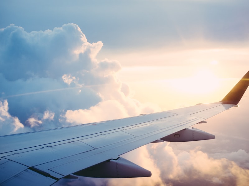 Best Budget Airlines Europe 2026 - Airplane wing at sunset